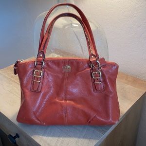 Burnt Orange colored Coach purse